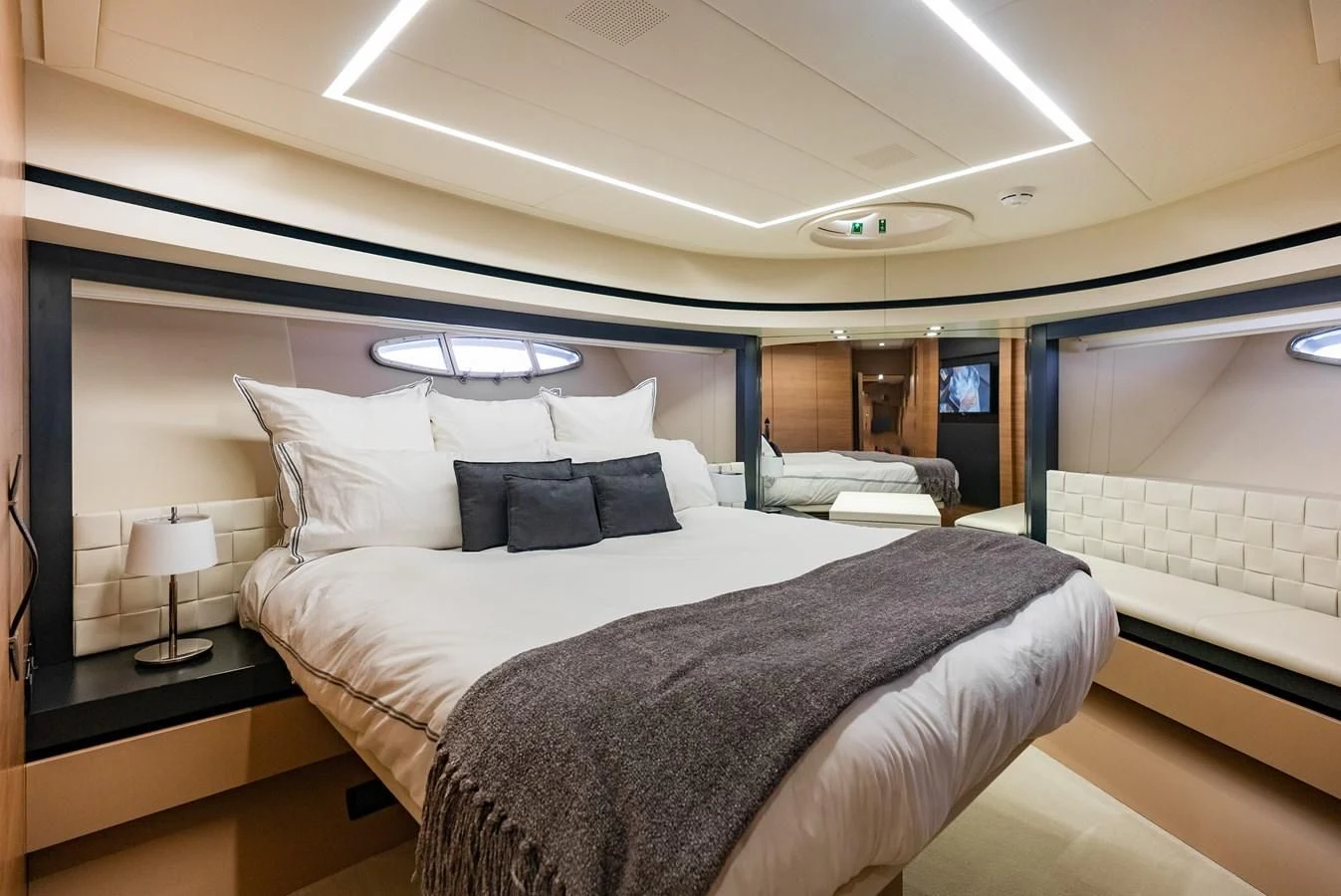 a bed with white sheets aboard TINE V Yacht for Sale
