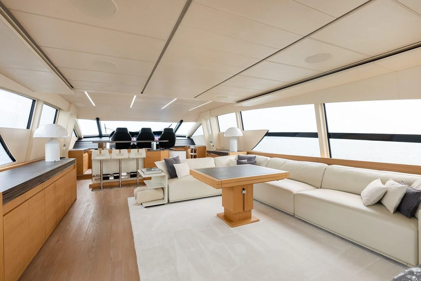 a living room with a couch and a table aboard TINE V Yacht for Sale