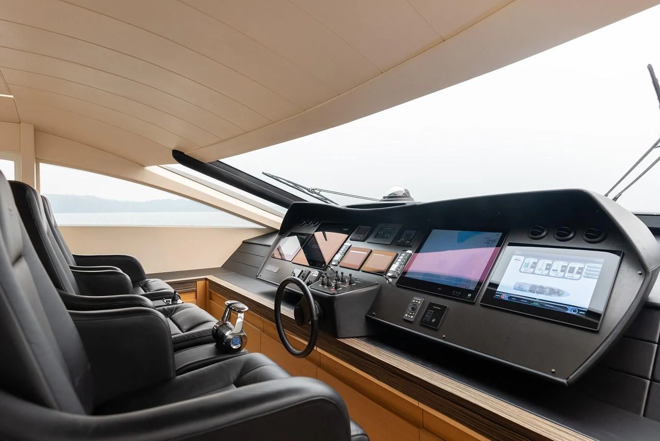 a car with a screen and a screen on the dashboard aboard TINE V Yacht for Sale