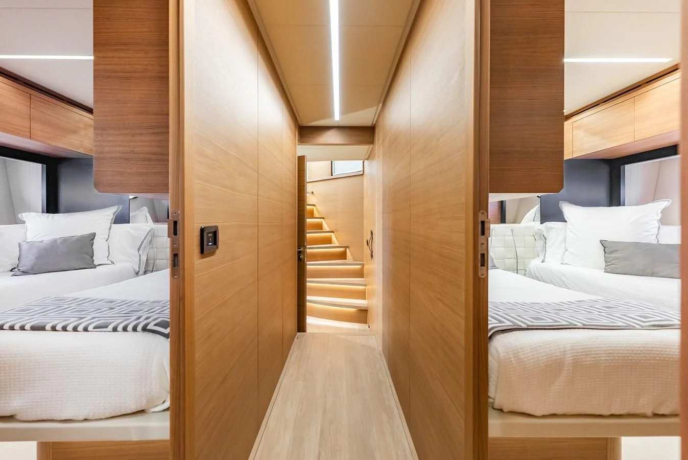 a room with two beds aboard TINE V Yacht for Sale