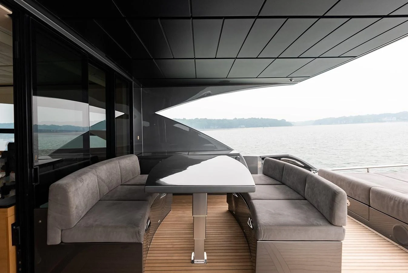 a room with a couch and a table aboard TINE V Yacht for Sale