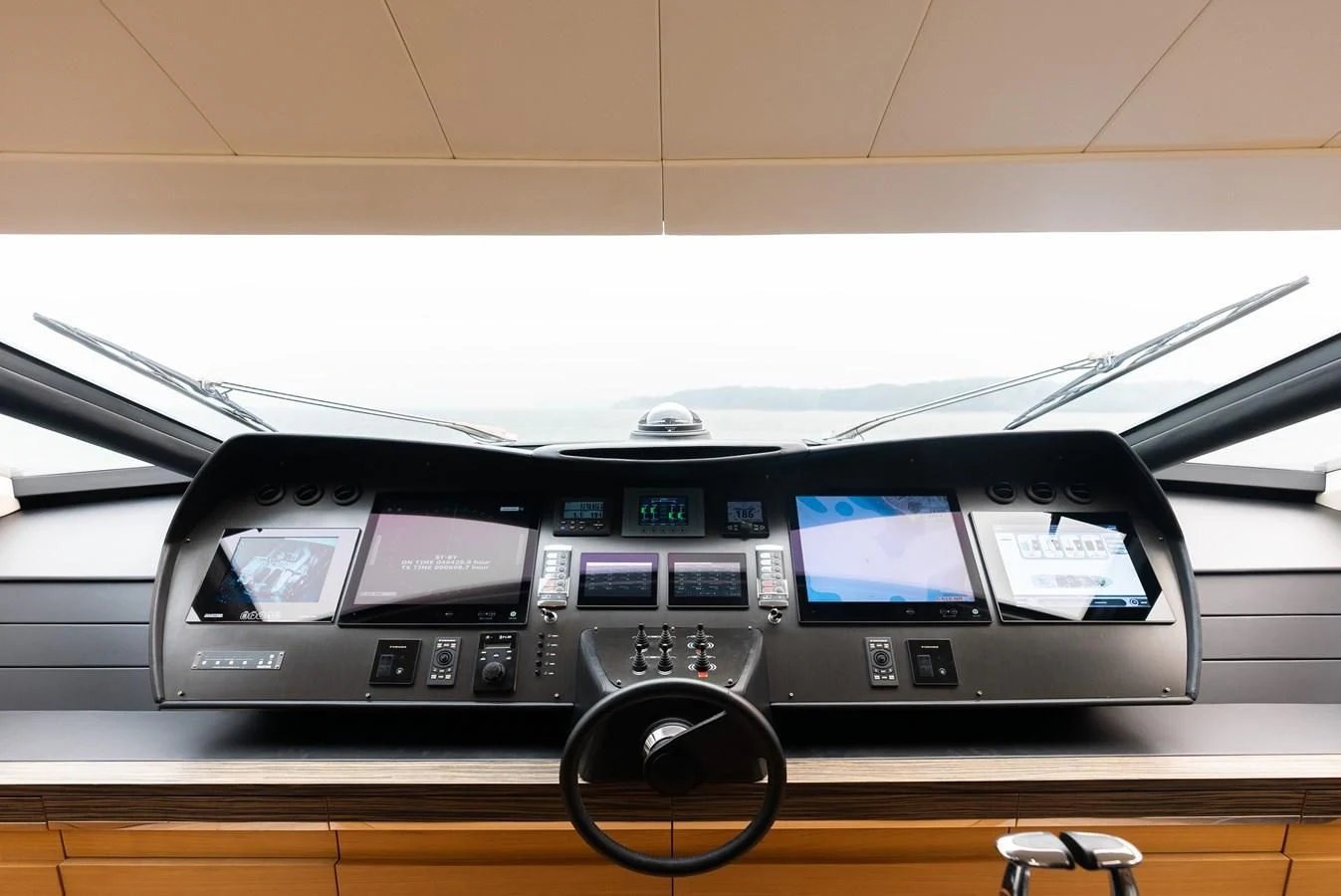 a car with a screen and a screen on the dashboard aboard TINE V Yacht for Sale