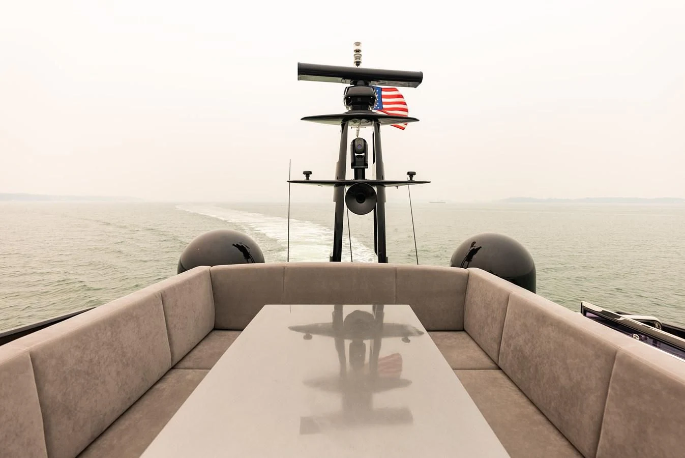 a cannon on a concrete wall aboard TINE V Yacht for Sale
