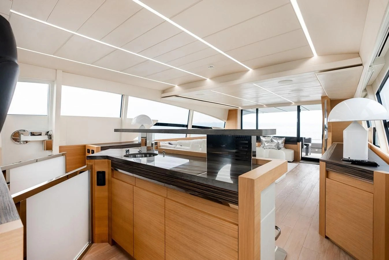 a kitchen with a large island aboard TINE V Yacht for Sale