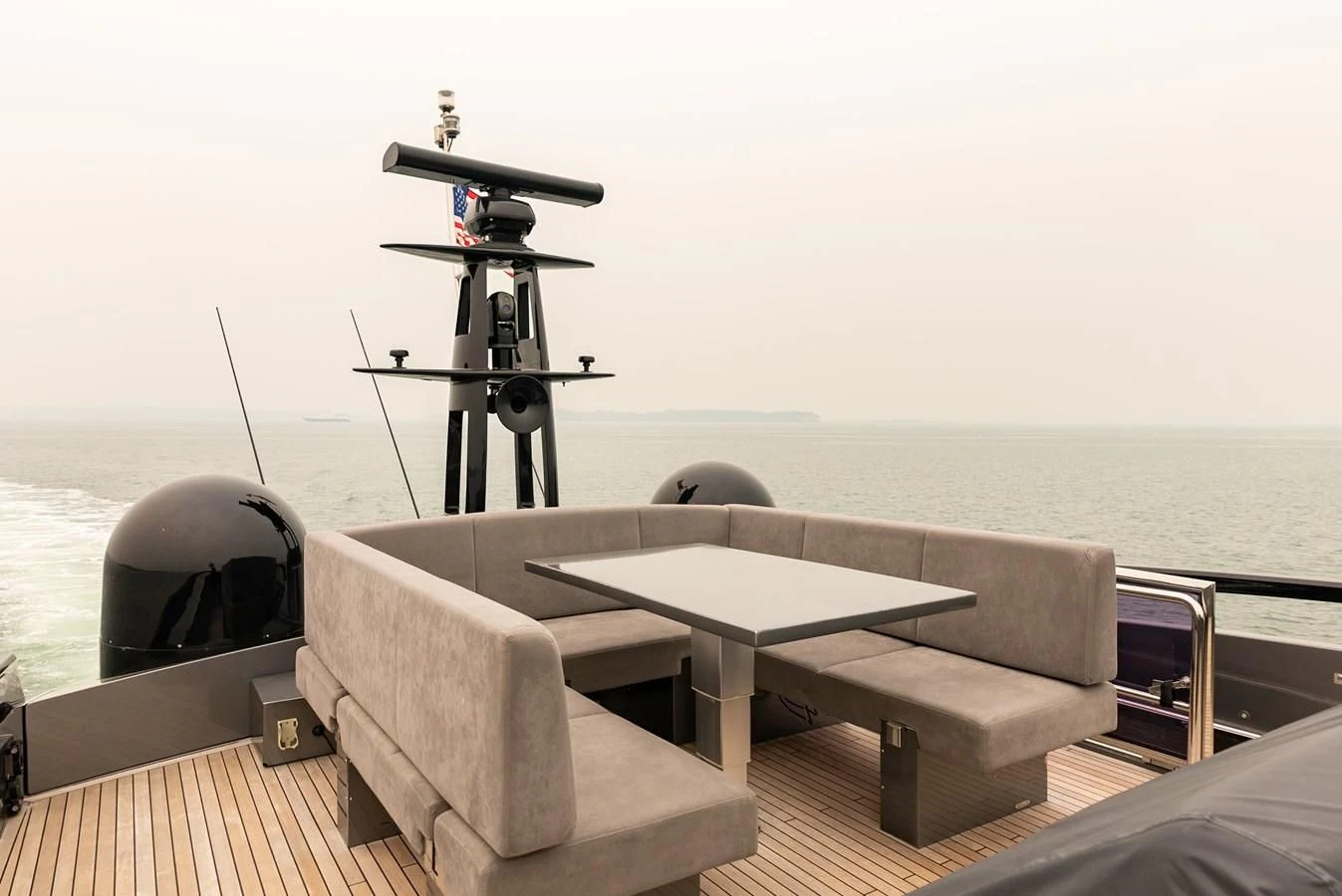 a camera on a table aboard TINE V Yacht for Sale