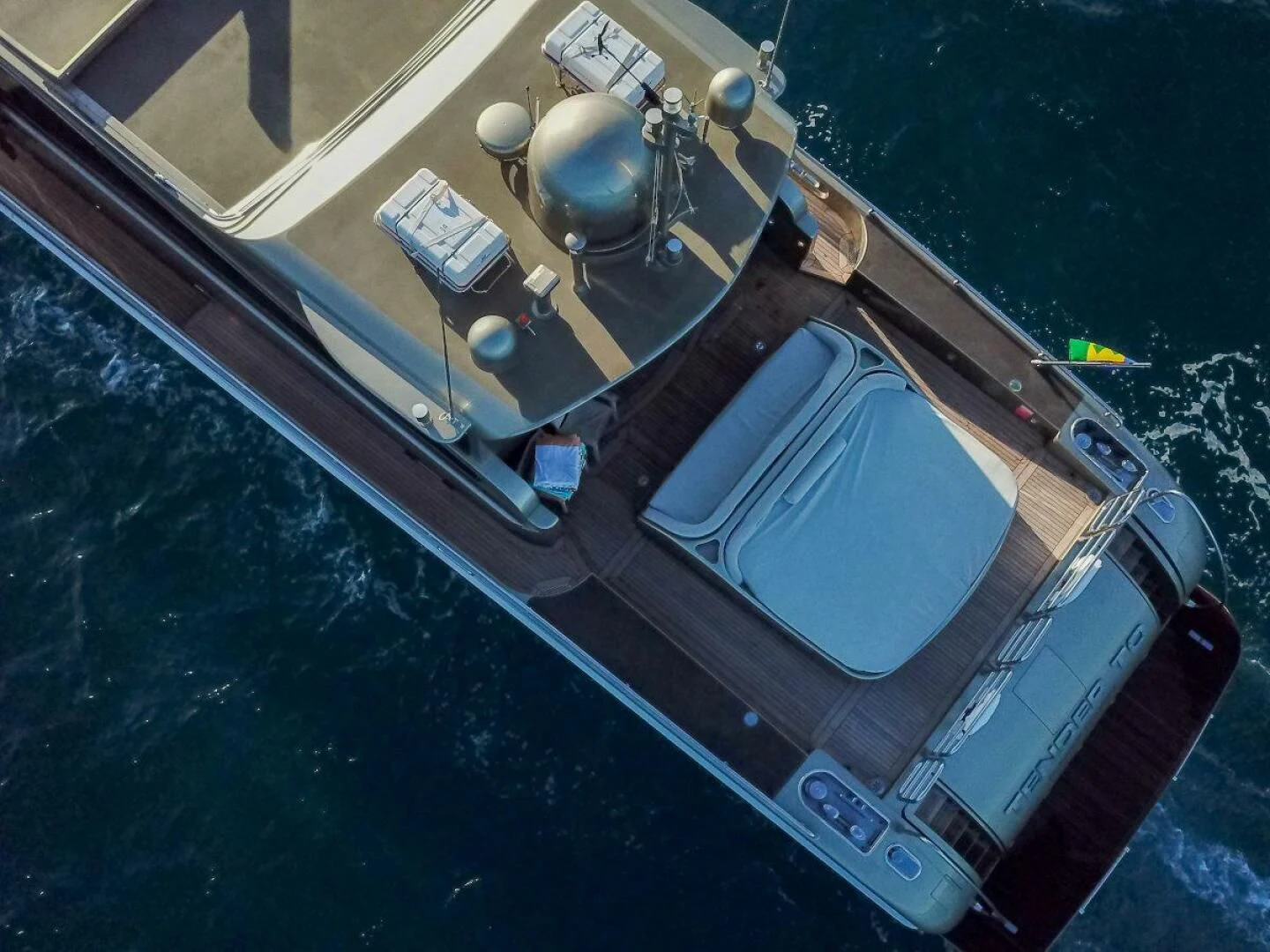 a large blue object with a round object in it aboard TENDER TO Yacht for Sale