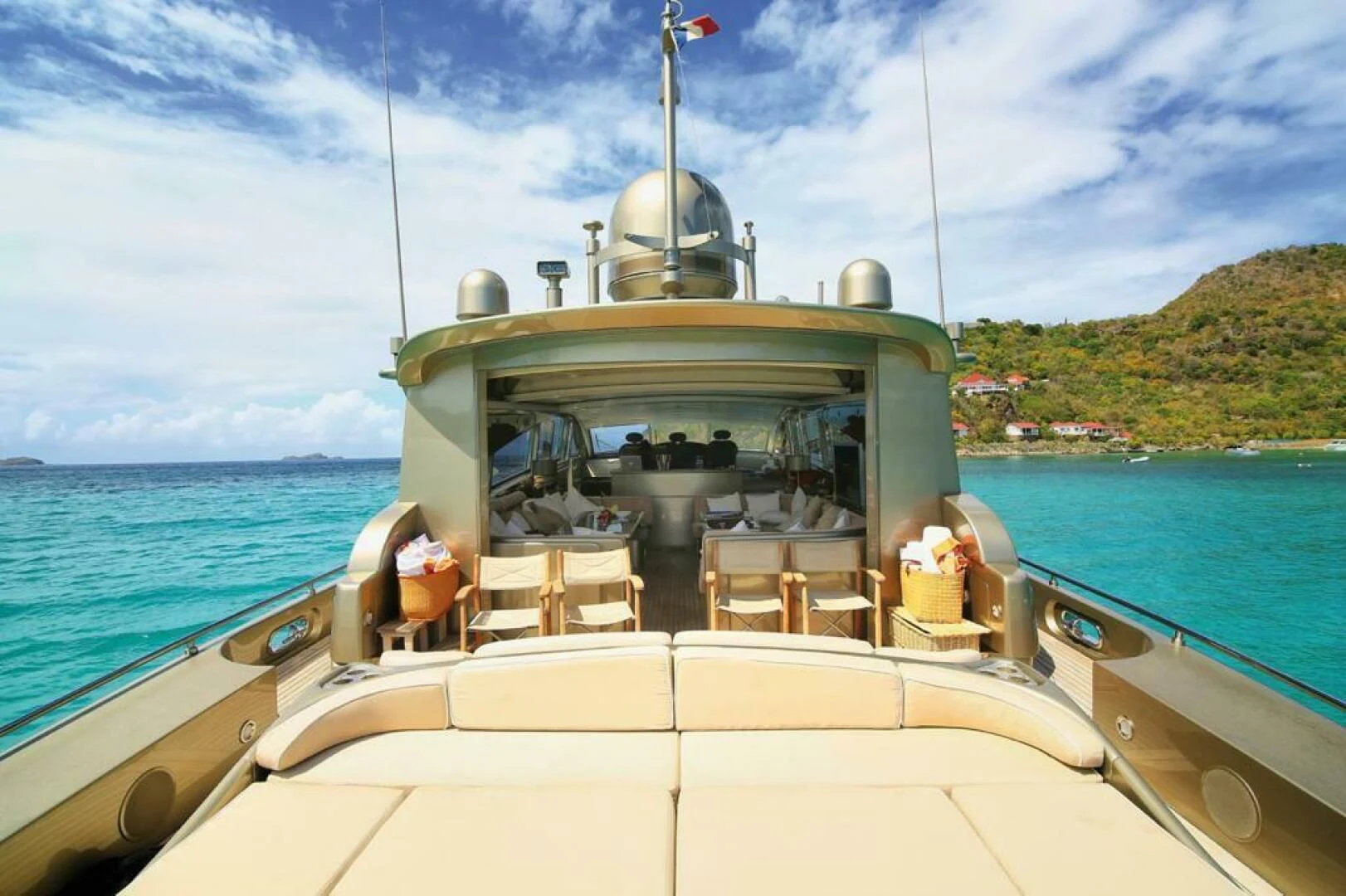 a boat with a large antenna on the back aboard TENDER TO Yacht for Sale
