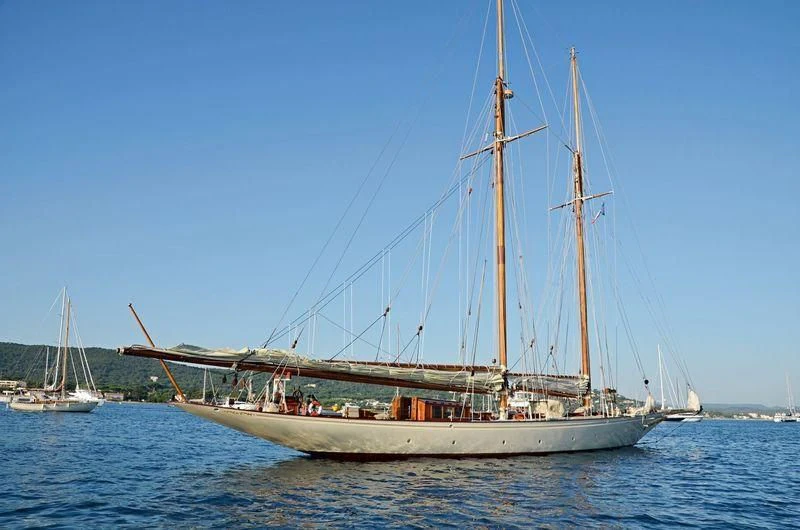 a sailboat in the water aboard SUNSHINE Yacht for Sale