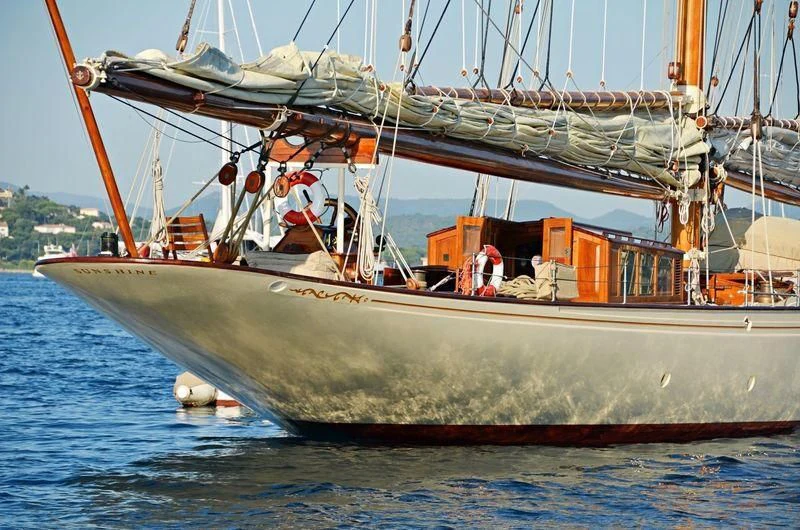 a large boat with a crane aboard SUNSHINE Yacht for Sale