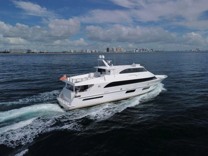 a white yacht on the water aboard OBSESSION Yacht for Sale