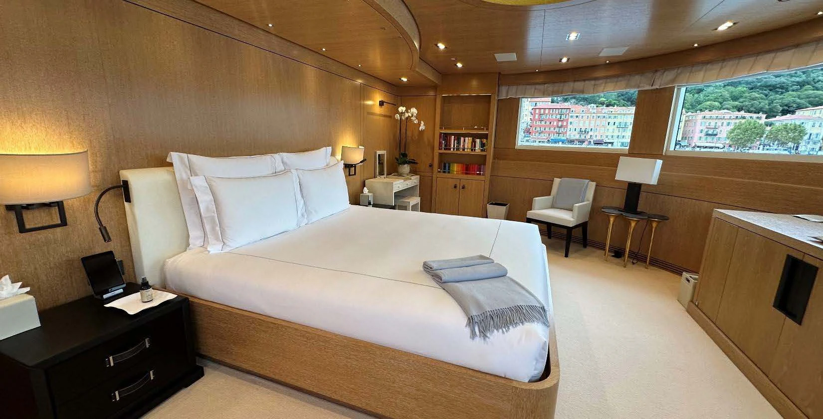 a large bedroom with a large bed aboard BELONGERS Yacht for Sale