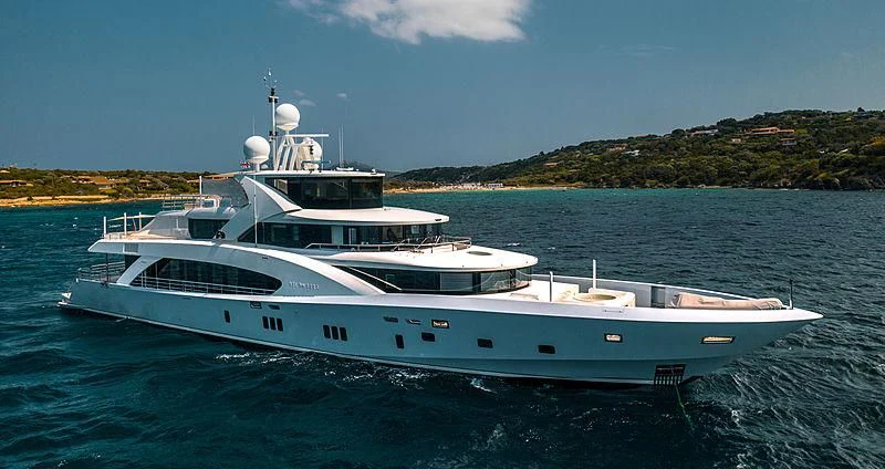 a white yacht in the water aboard BELONGERS Yacht for Sale