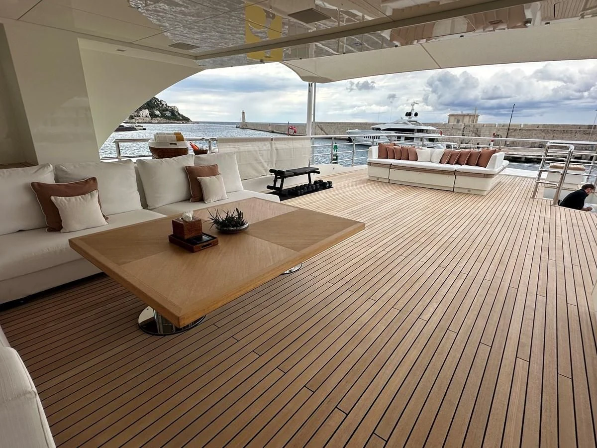 a room with a couch and a table aboard BELONGERS Yacht for Sale