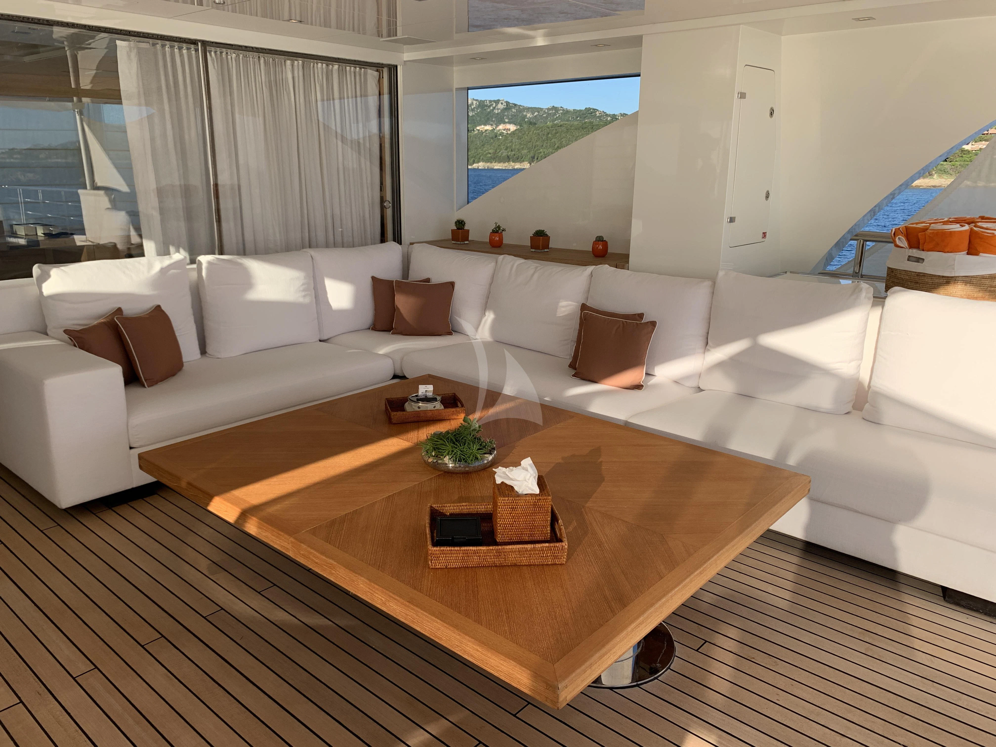 a living room with a large sofa aboard BELONGERS Yacht for Sale