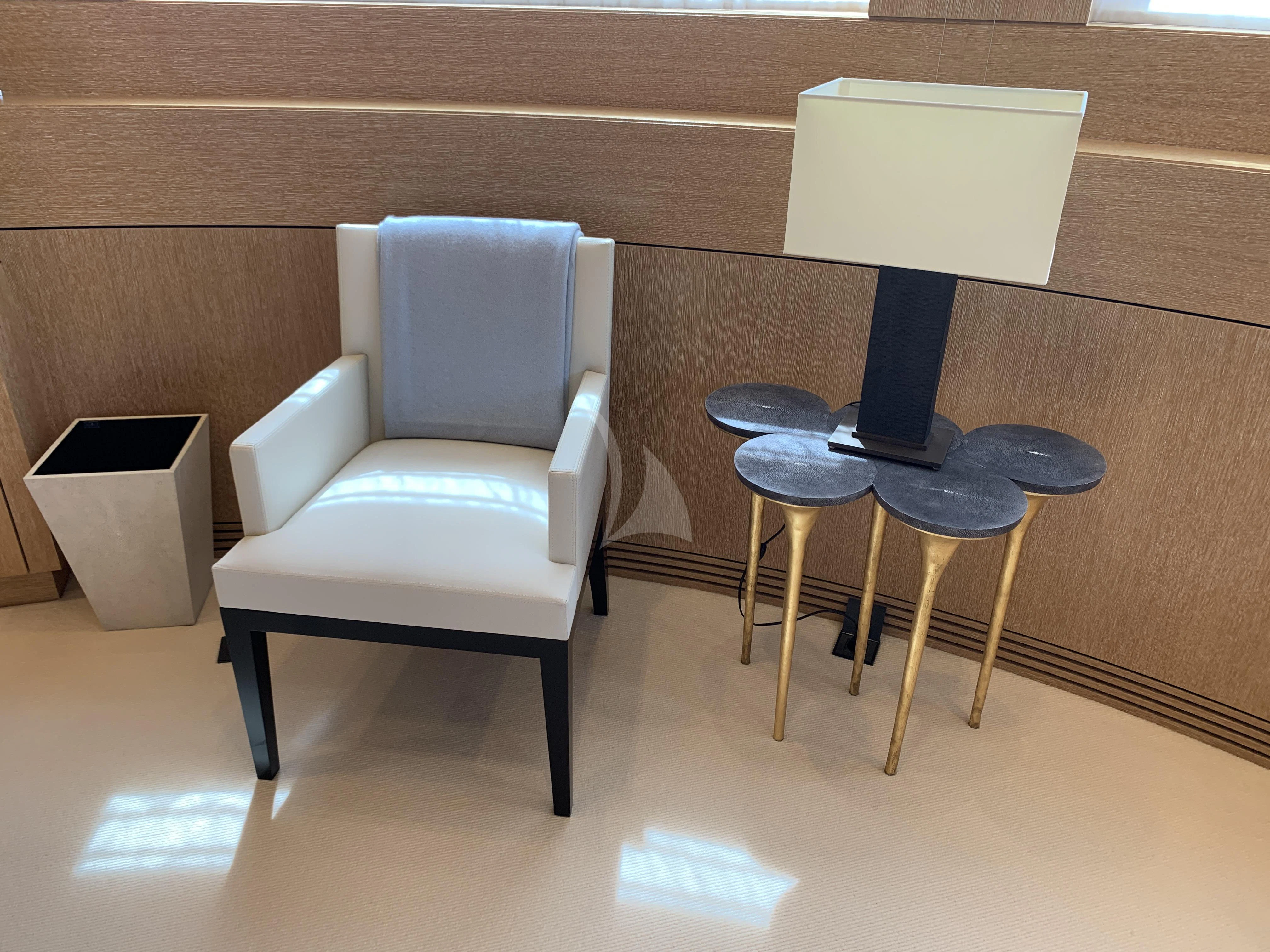 a few chairs in a room aboard BELONGERS Yacht for Sale