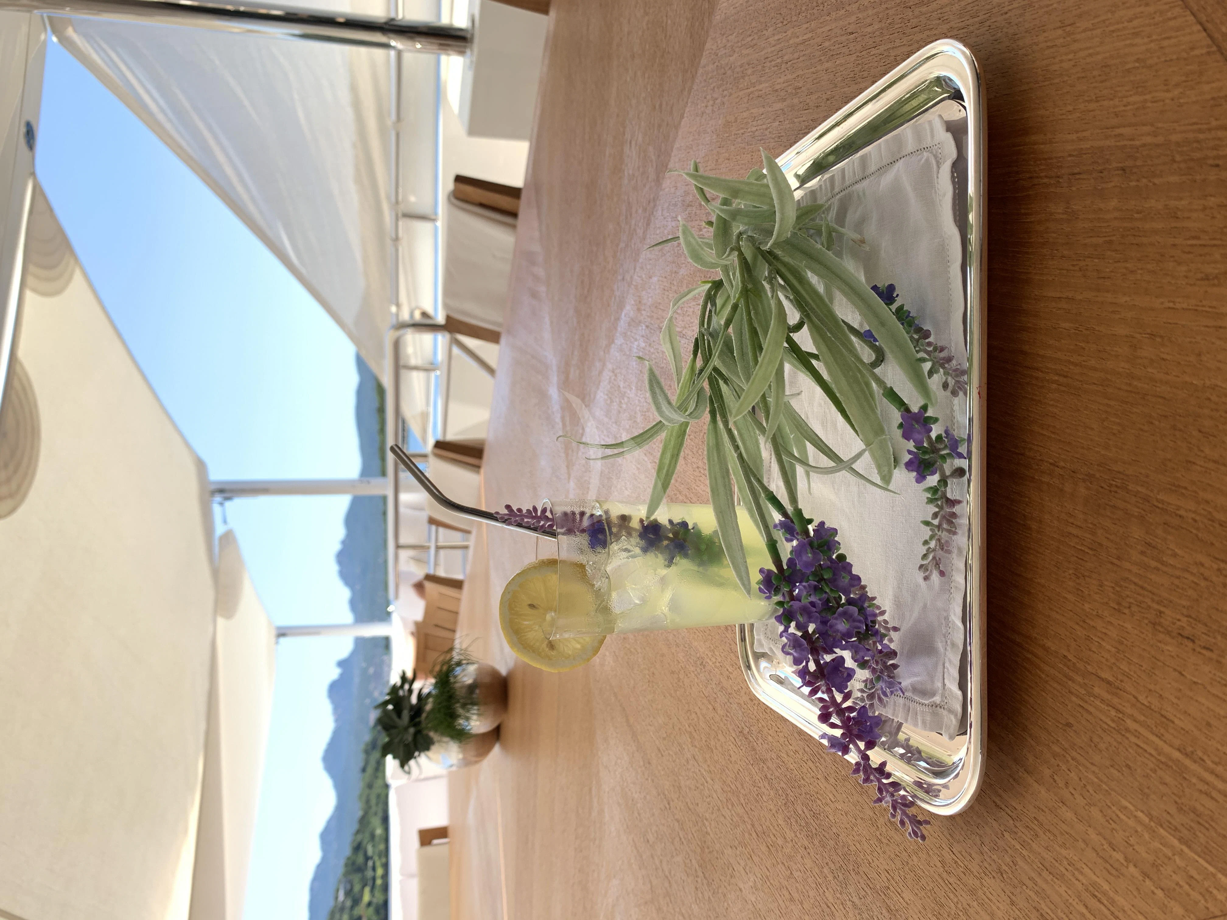 a vase with flowers aboard BELONGERS Yacht for Sale