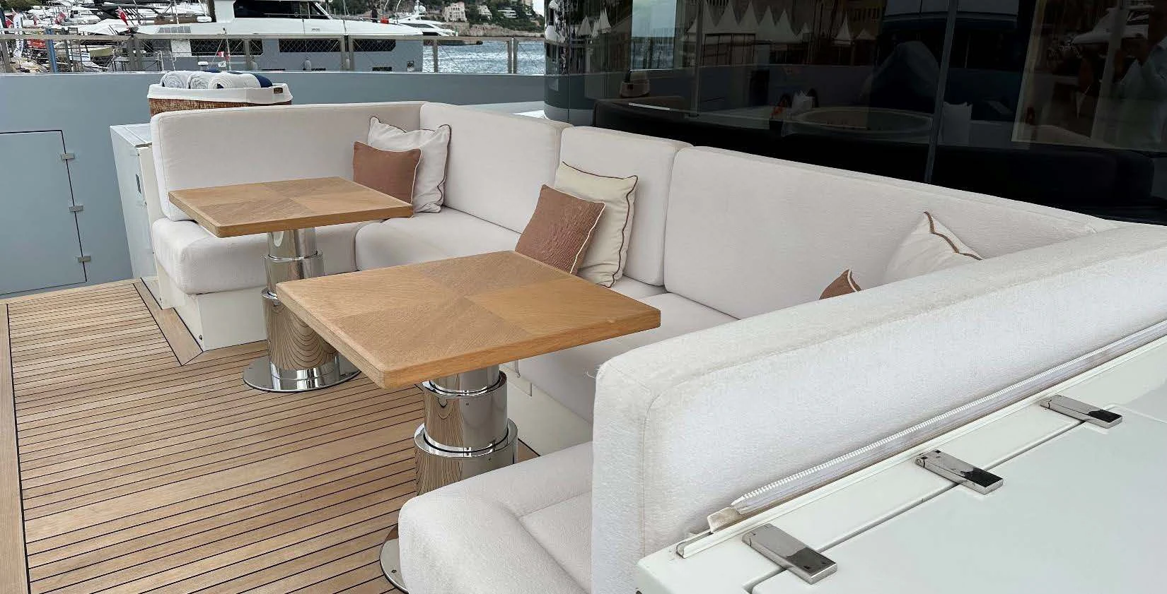 a white couch and coffee table aboard BELONGERS Yacht for Sale