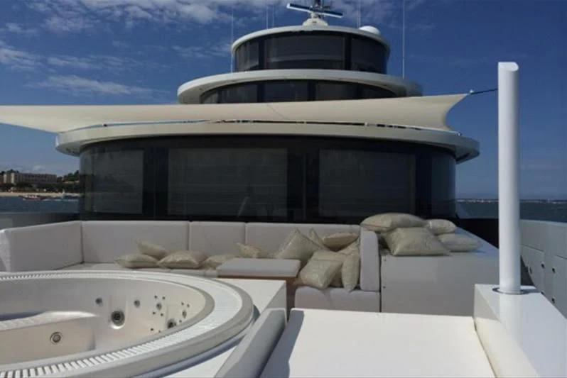 a large white building with a large white roof aboard BELONGERS Yacht for Sale