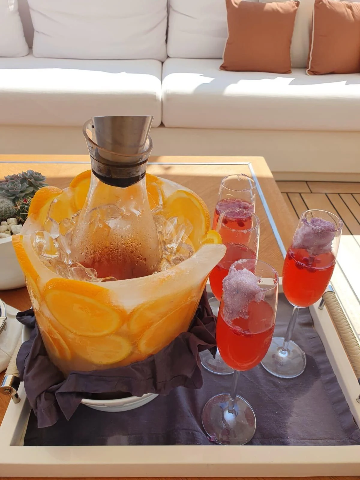 a group of colorful drinks on a table aboard BELONGERS Yacht for Sale