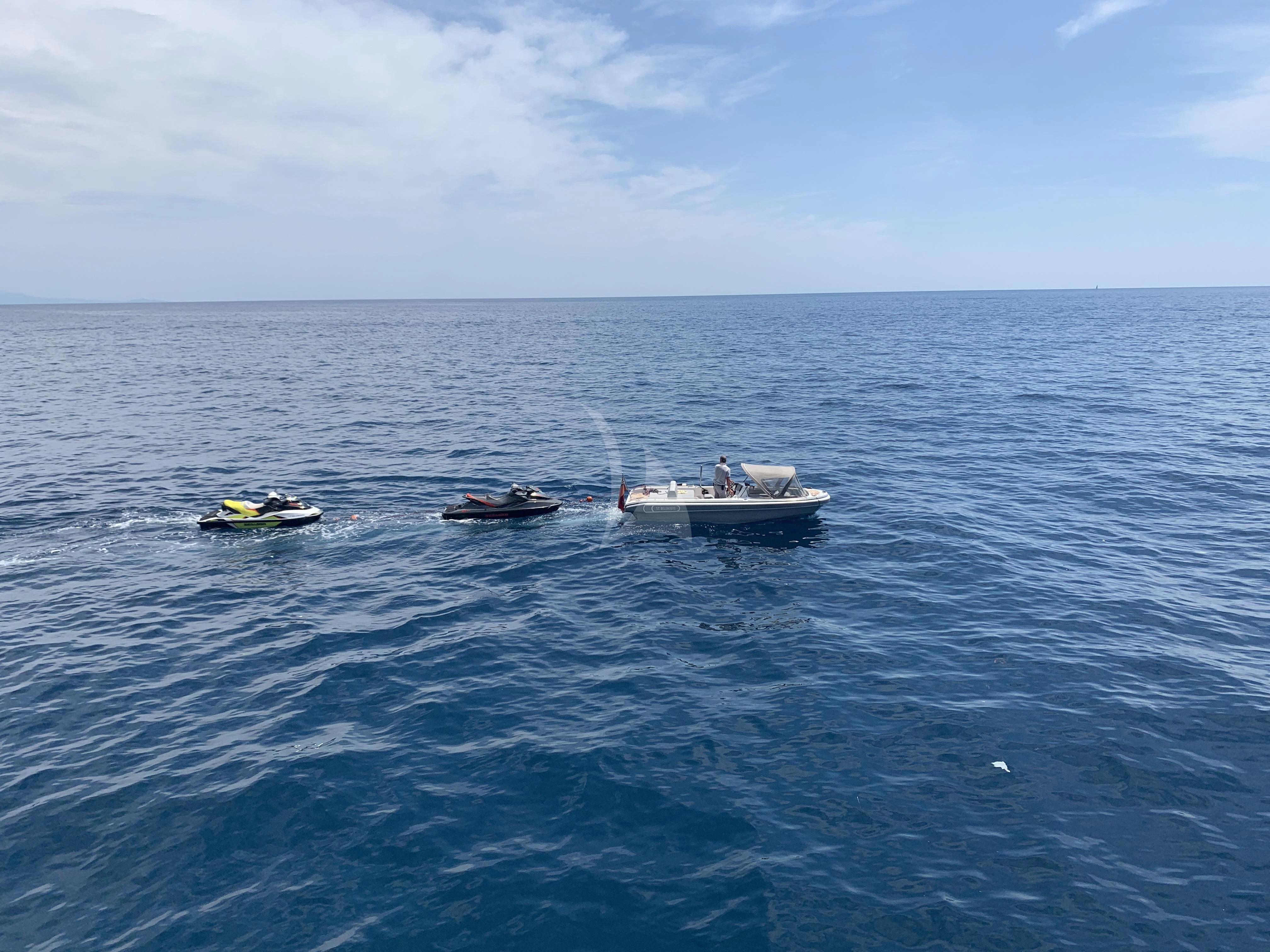 a group of boats in the ocean aboard BELONGERS Yacht for Sale