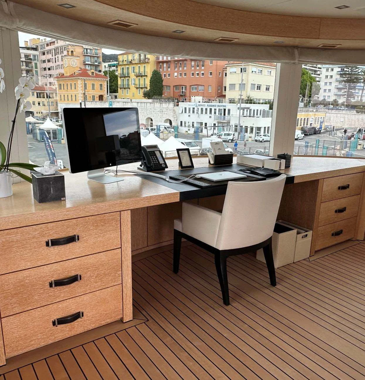 a room with a desk and computer aboard BELONGERS Yacht for Sale