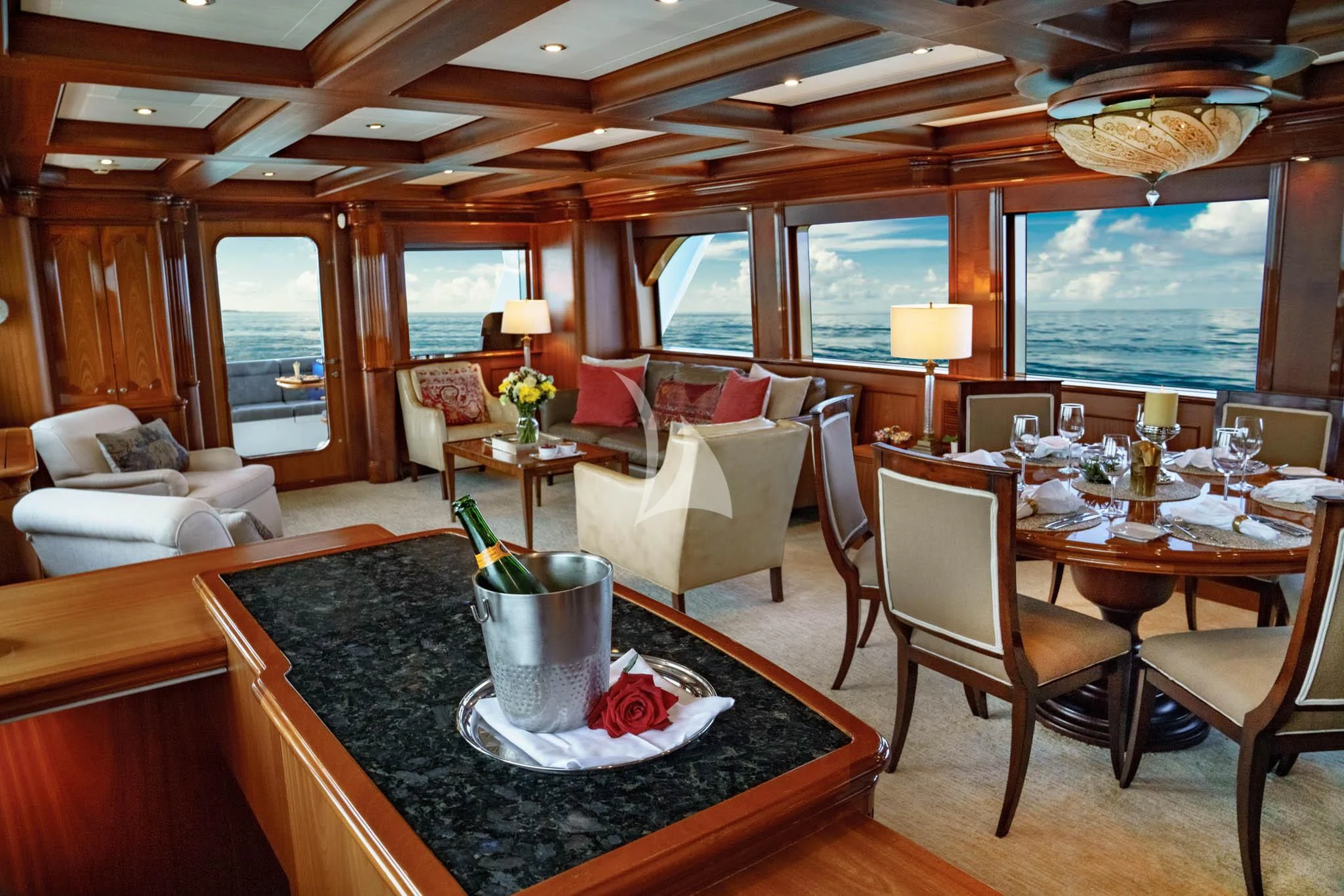 a dining room with a table and chairs aboard LADY VICTORY Yacht for Sale