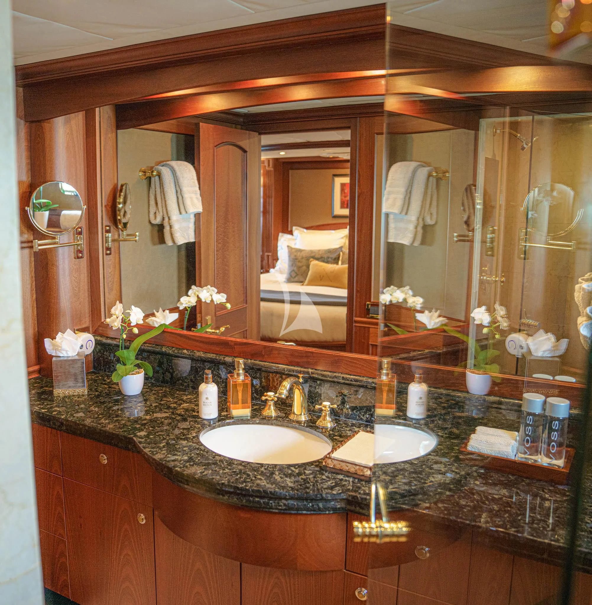 a bathroom with a large mirror aboard LADY VICTORY Yacht for Sale