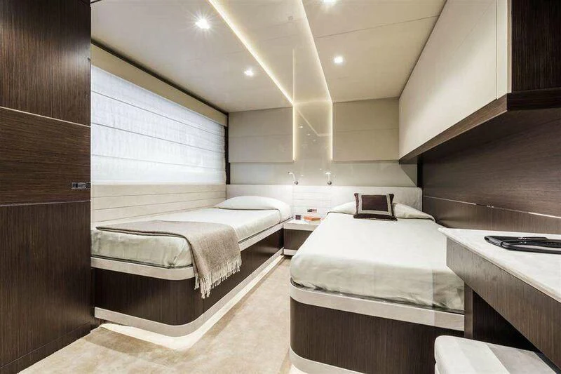 a room with two beds aboard MIKIL Yacht for Sale