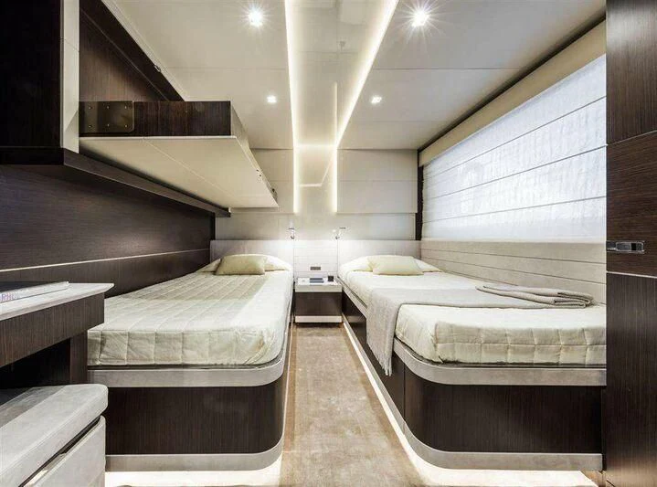 a room with several beds aboard MIKIL Yacht for Sale