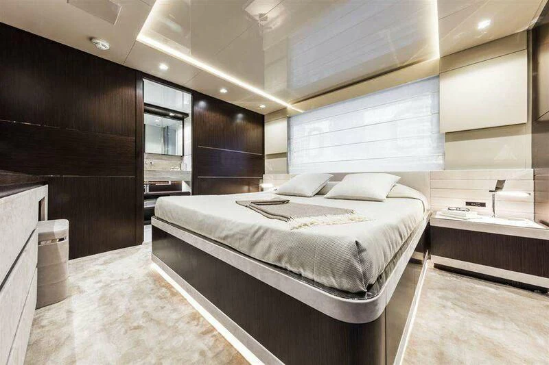 a room with a bed and a desk aboard MIKIL Yacht for Sale
