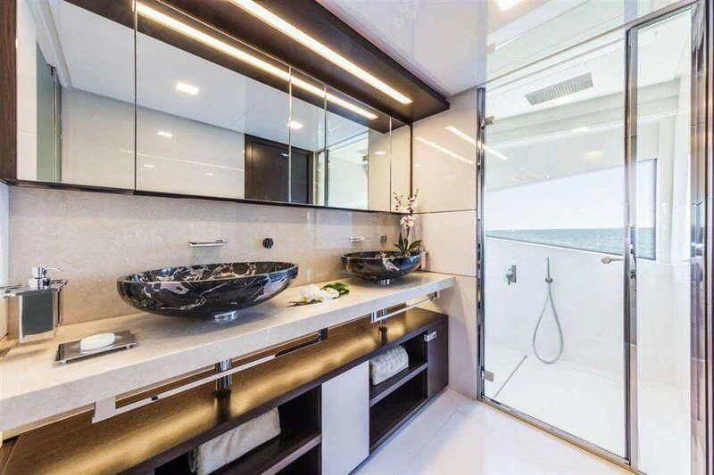 a kitchen with a sink and cabinets aboard MIKIL Yacht for Sale