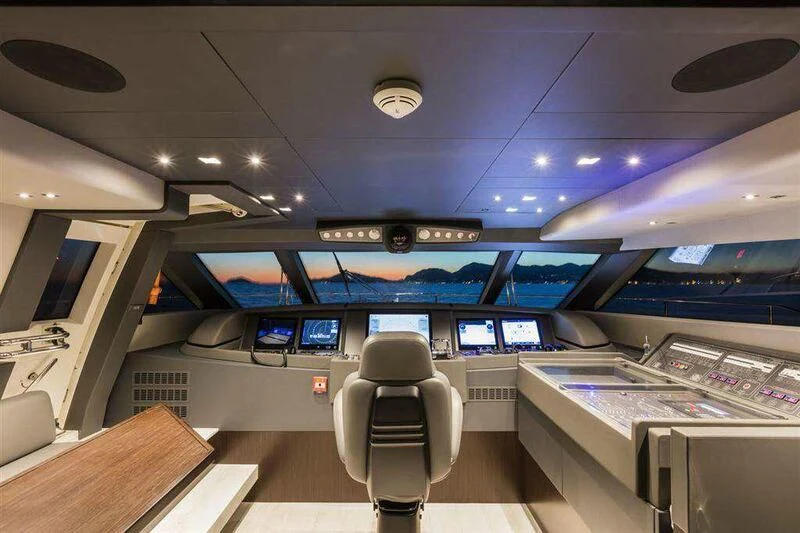 an airplane cockpit with many screens aboard MIKIL Yacht for Sale