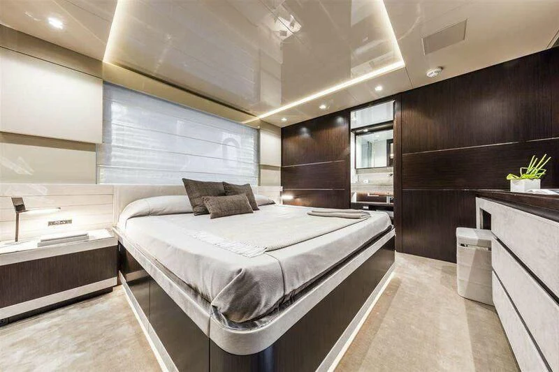a room with a bed and a desk aboard MIKIL Yacht for Sale