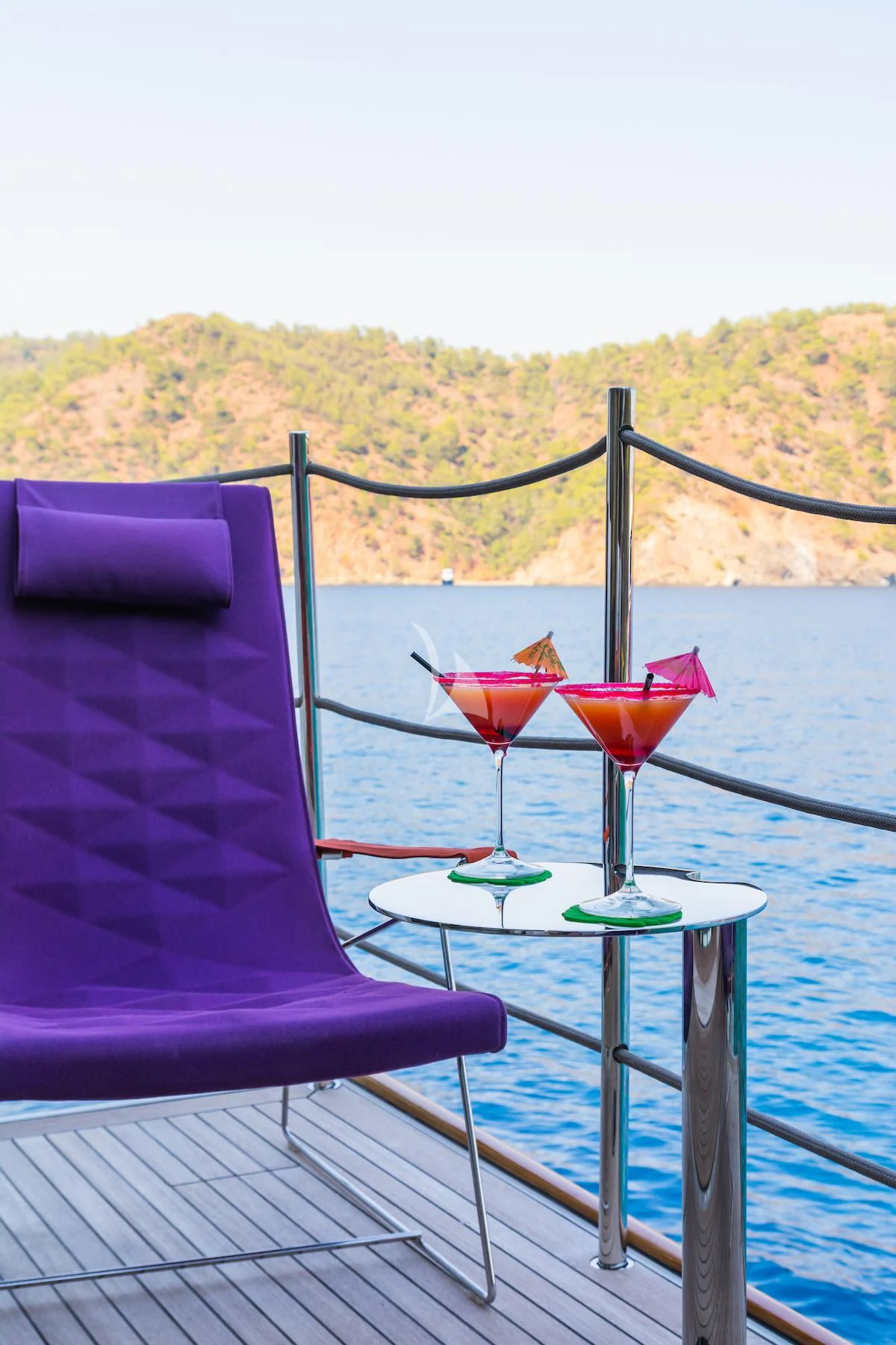 a table with drinks on it aboard TAKARA ONE Yacht for Charter