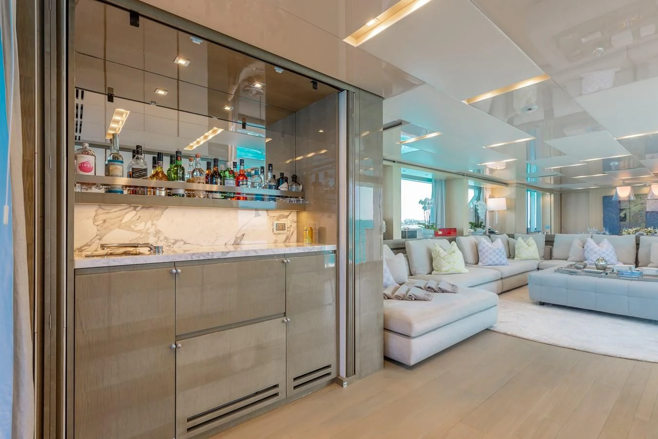 a room with a large mirror aboard TAKARA ONE Yacht for Charter