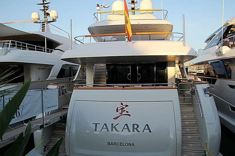 a boat on a dock aboard TAKARA ONE Yacht for Charter
