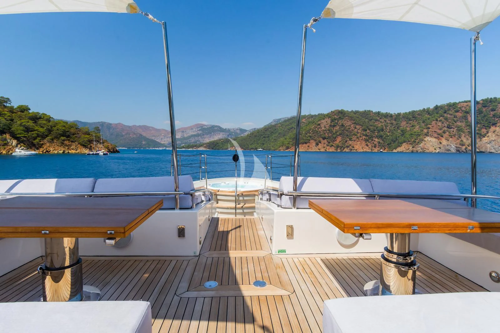 a deck with a boat on it aboard TAKARA ONE Yacht for Charter