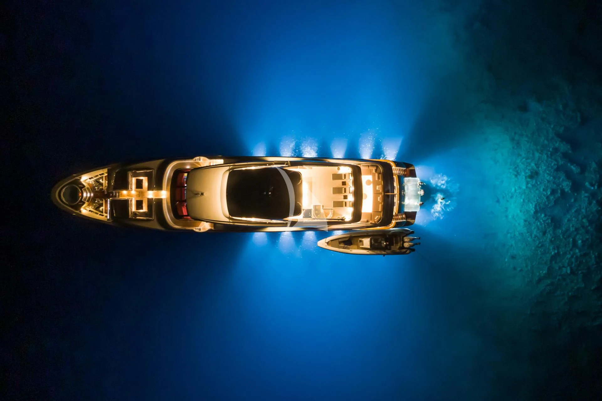 a gold and silver lighter aboard TAKARA ONE Yacht for Charter