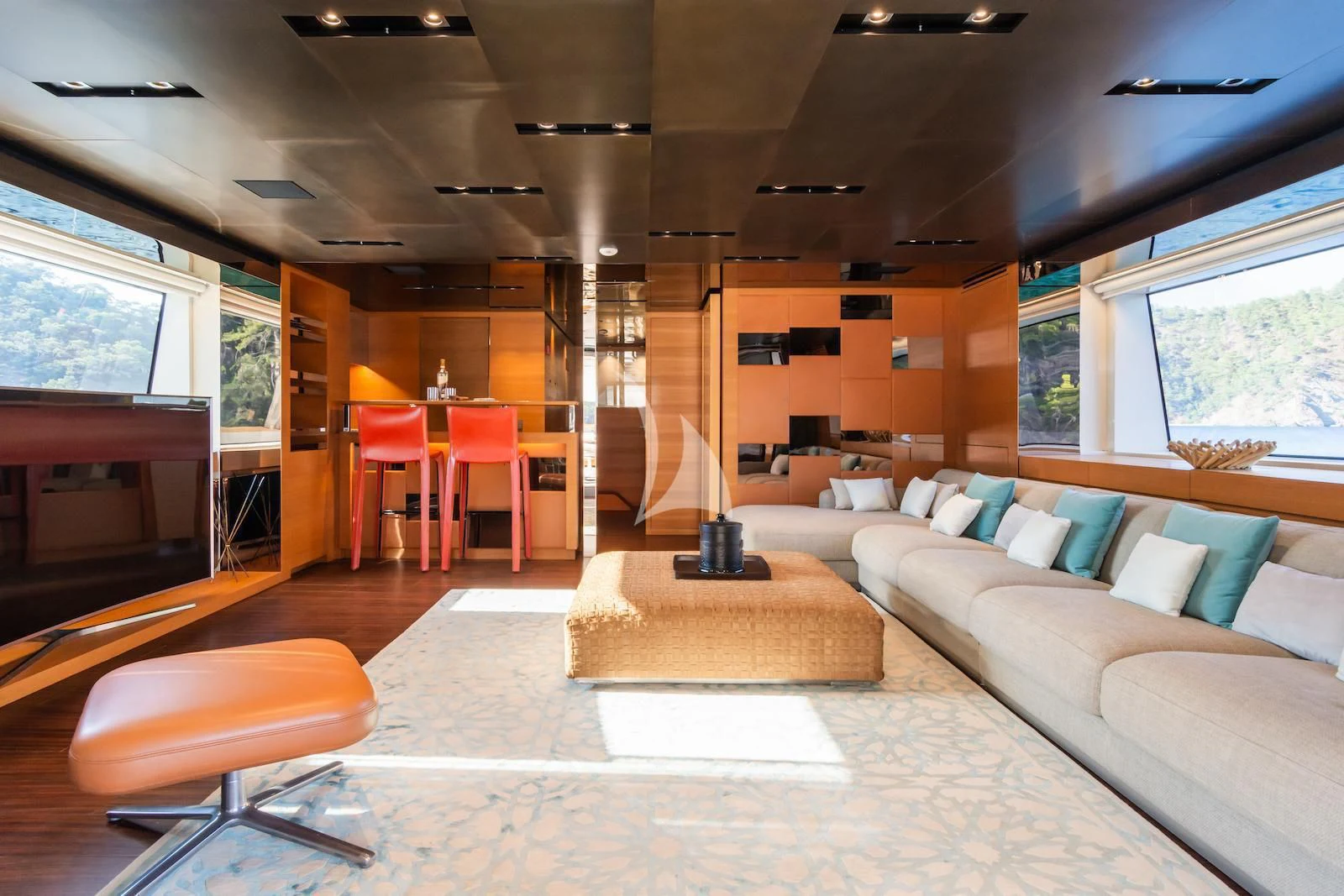 a living room with a large rug aboard TAKARA ONE Yacht for Charter