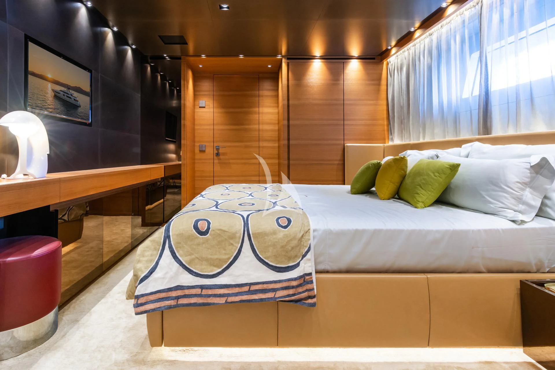 a hat on a bed aboard TAKARA ONE Yacht for Charter