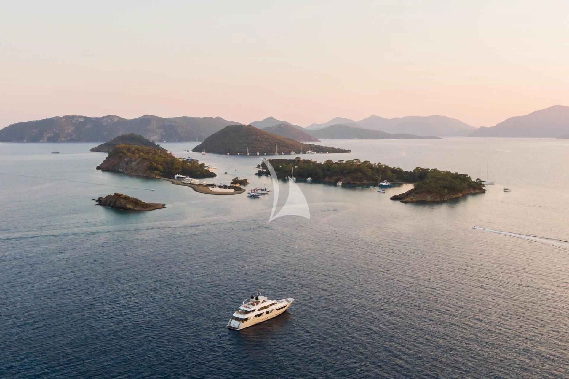 a boat sailing on the sea aboard TAKARA ONE Yacht for Charter