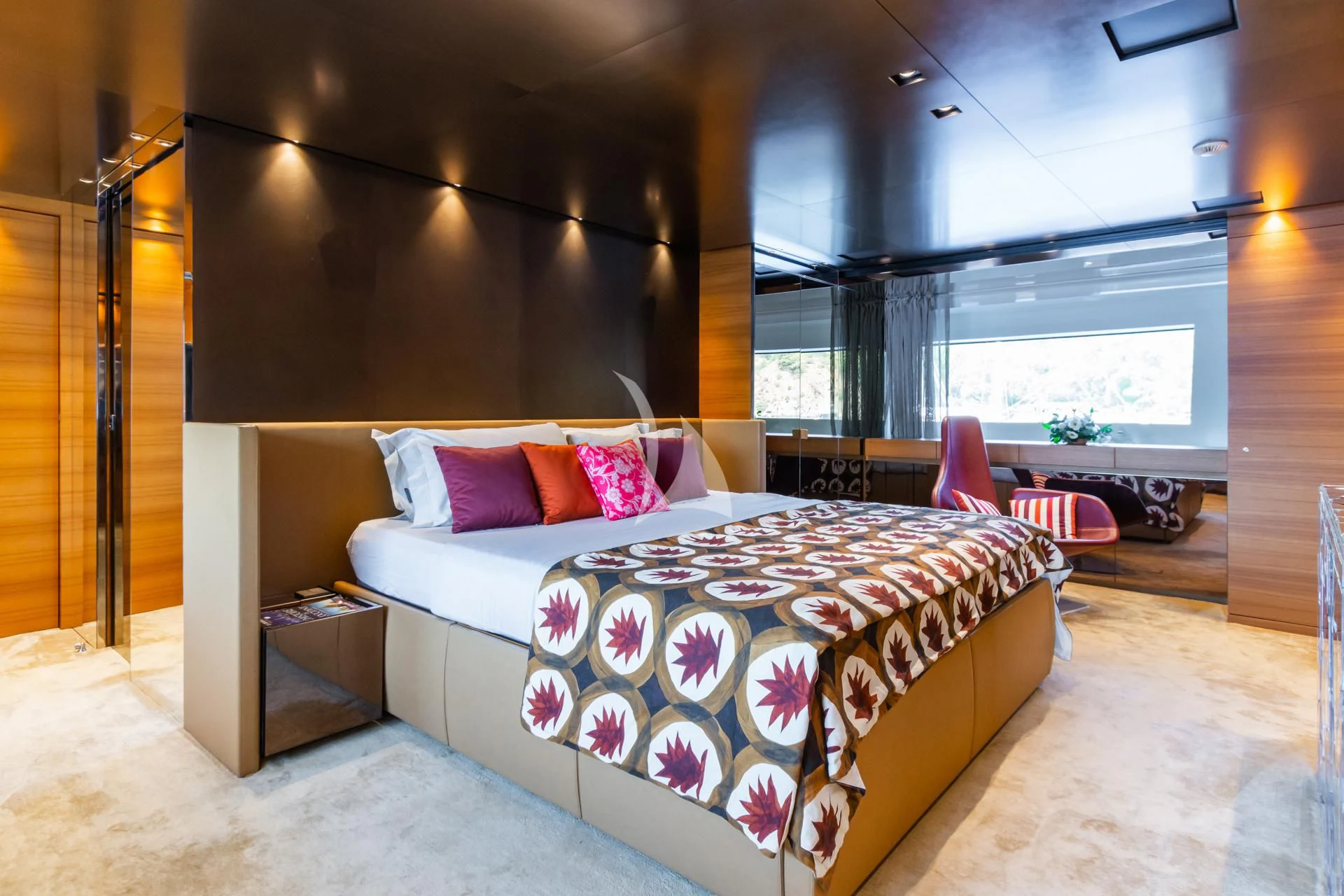 a bed in a room aboard TAKARA ONE Yacht for Charter
