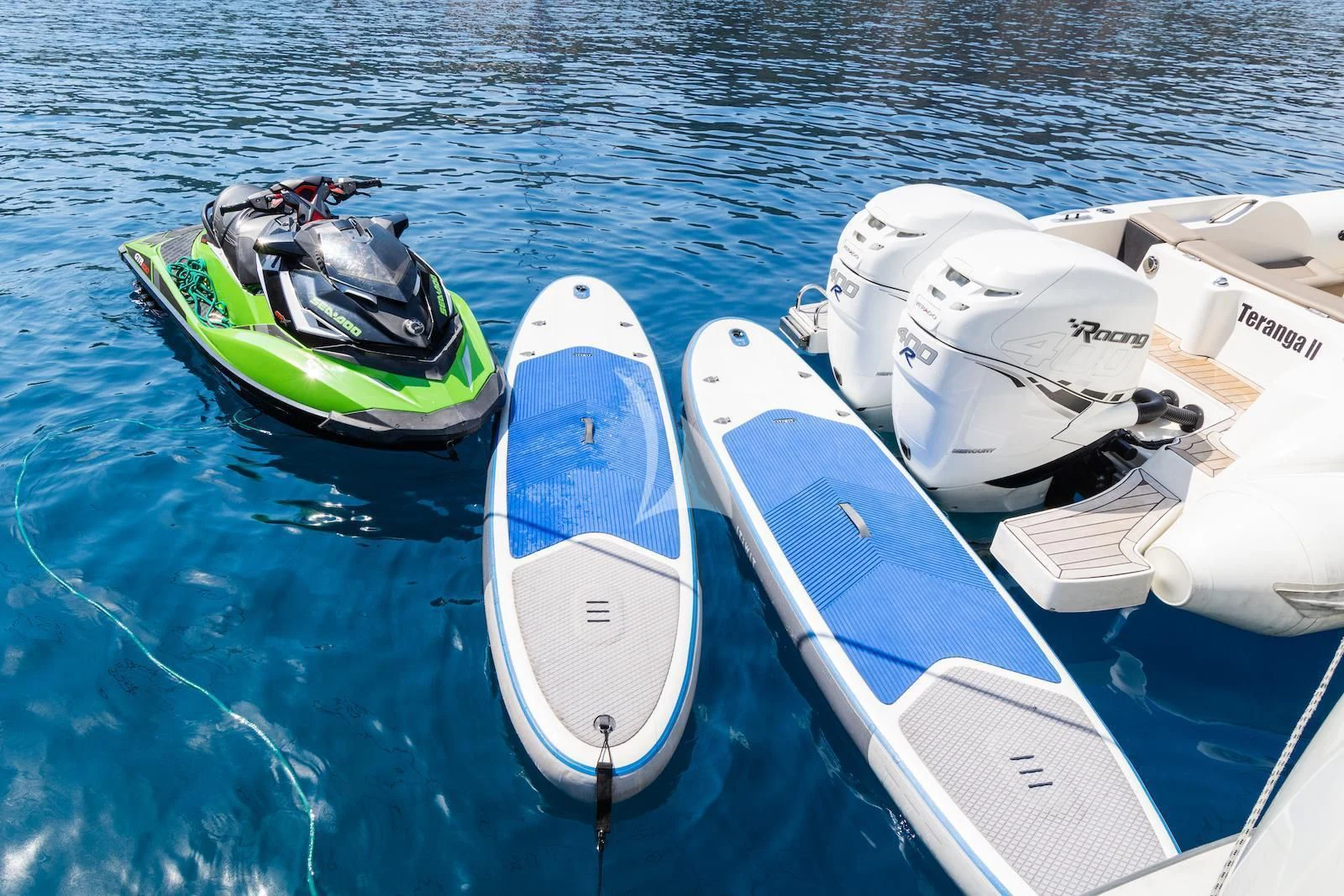 a group of boats in the water aboard TAKARA ONE Yacht for Charter