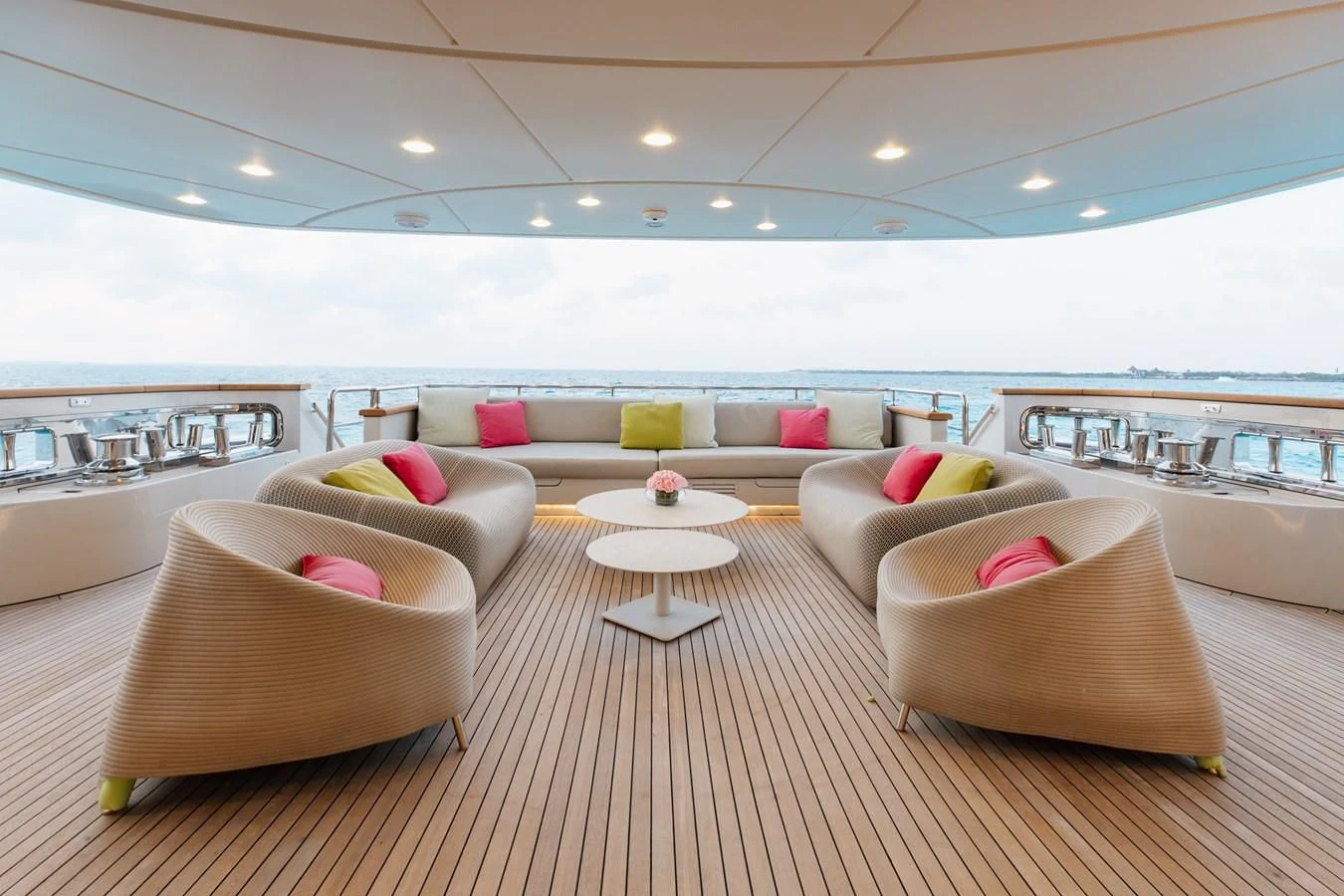 a room with couches and a table aboard TAKARA ONE Yacht for Charter