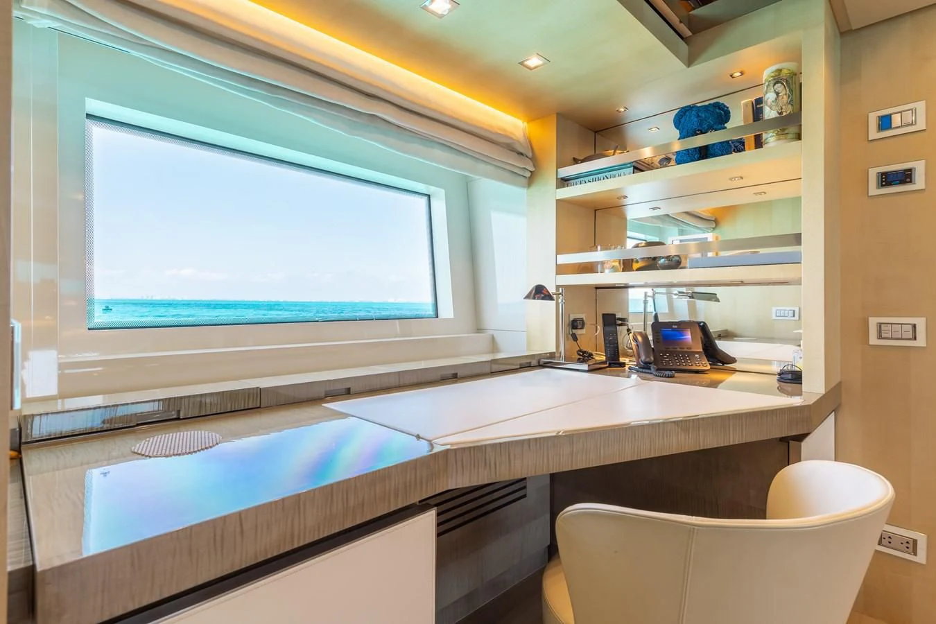a room with a large screen aboard TAKARA ONE Yacht for Charter