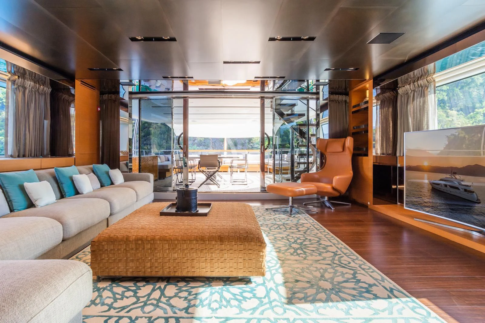 a living room with a fireplace aboard TAKARA ONE Yacht for Charter