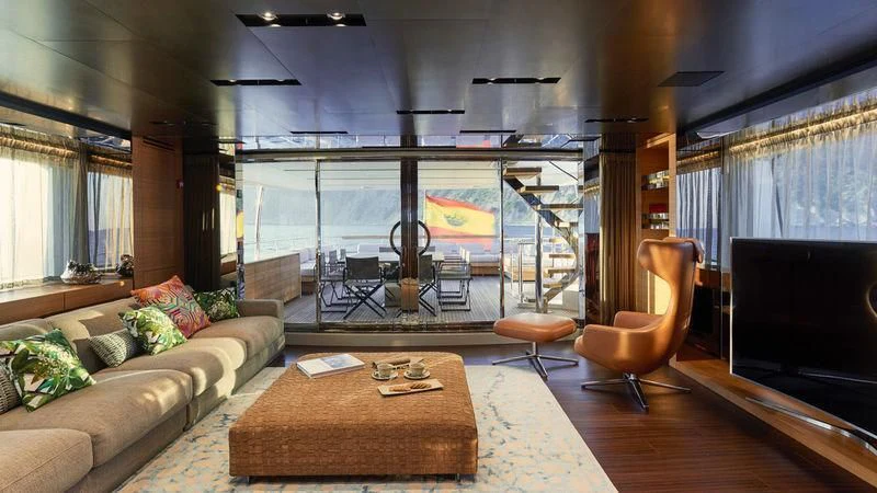 a living room with a large window aboard TAKARA ONE Yacht for Charter