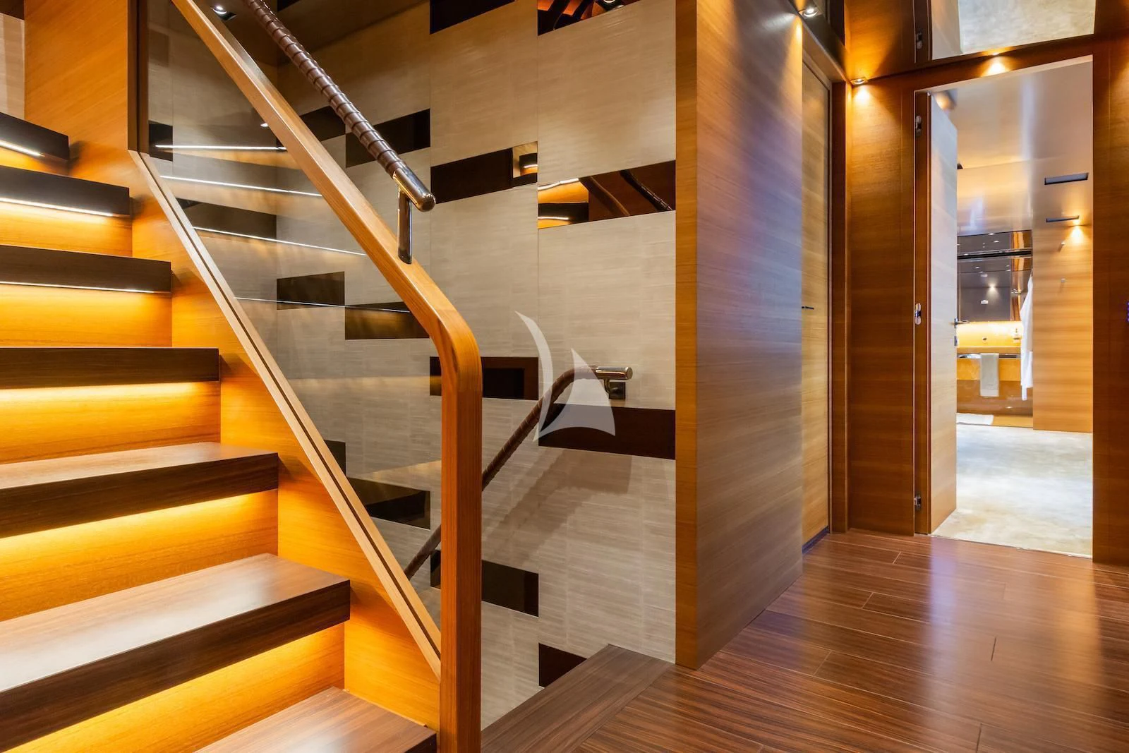 a set of stairs in a room aboard TAKARA ONE Yacht for Charter