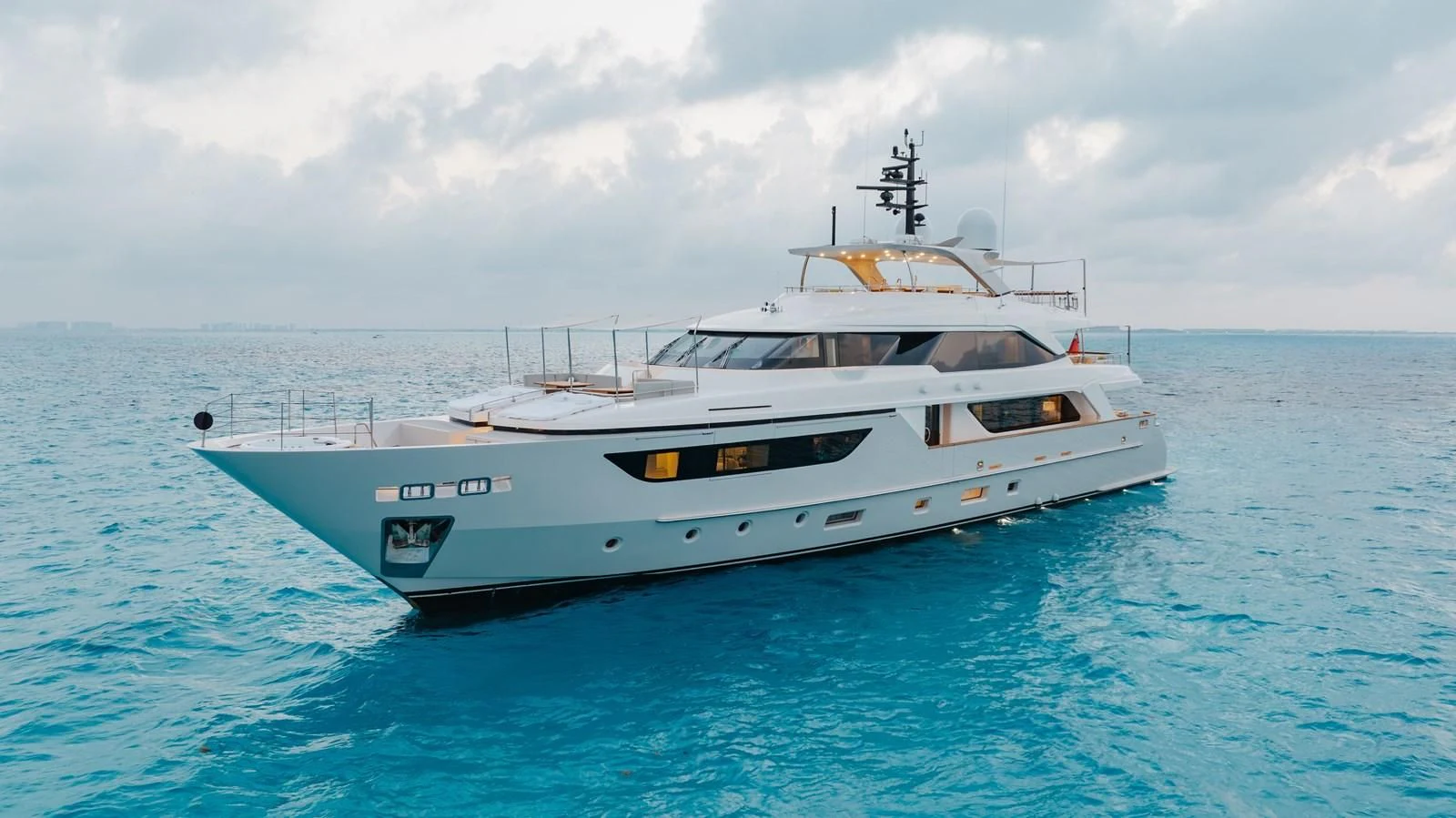 a white boat in the water aboard TAKARA ONE Yacht for Charter