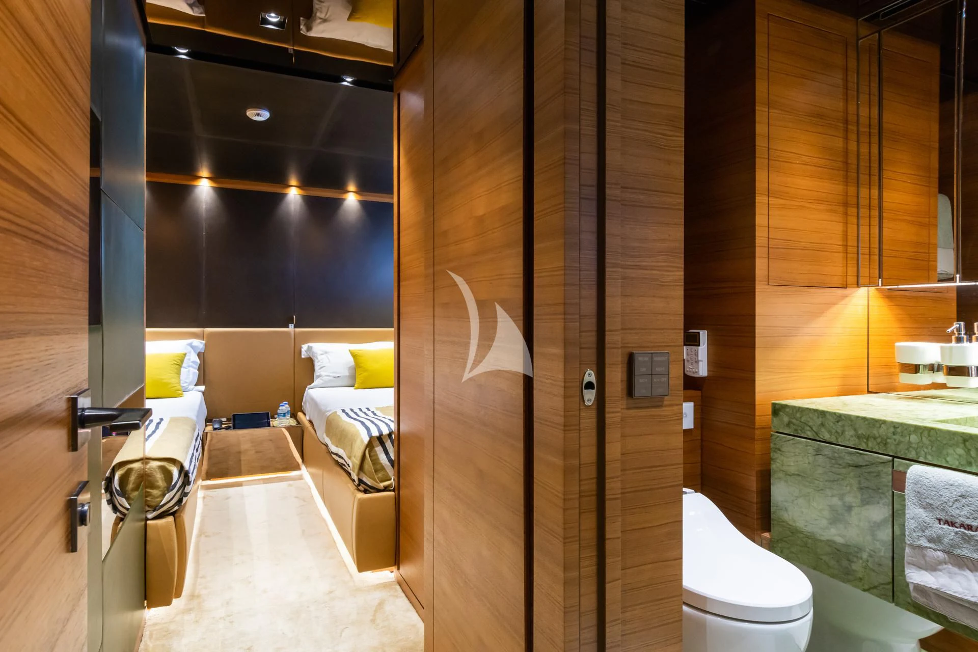 a bathroom with a glass shower aboard TAKARA ONE Yacht for Charter